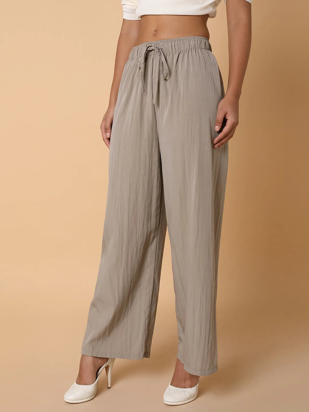 Women Solid Beige Straight Trouser