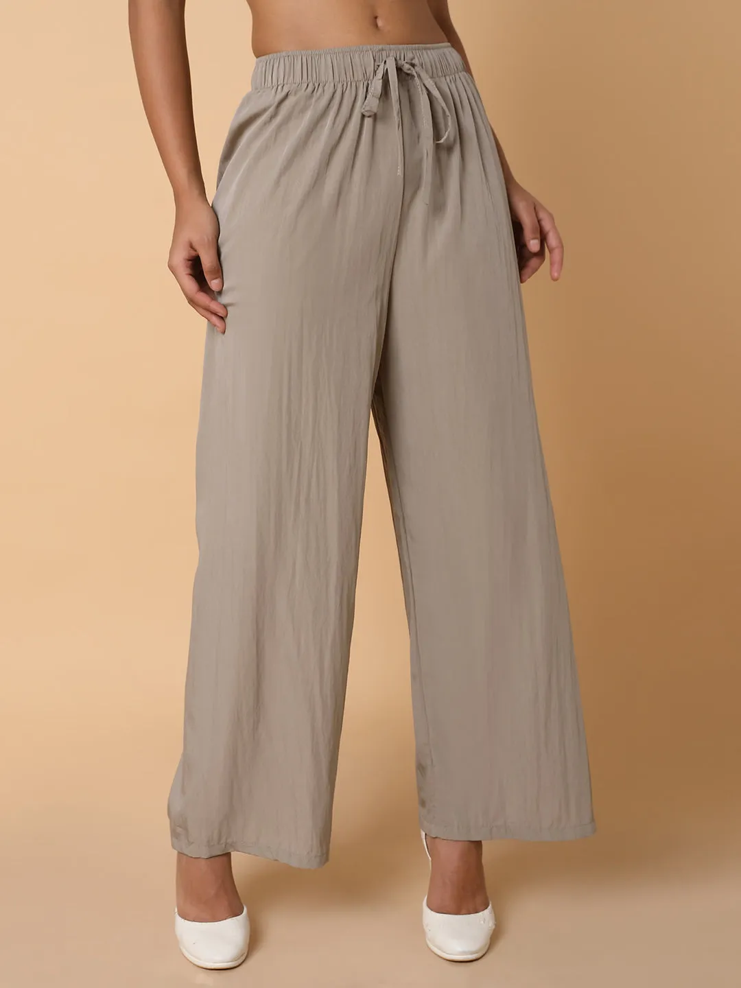 Women Solid Beige Straight Trouser